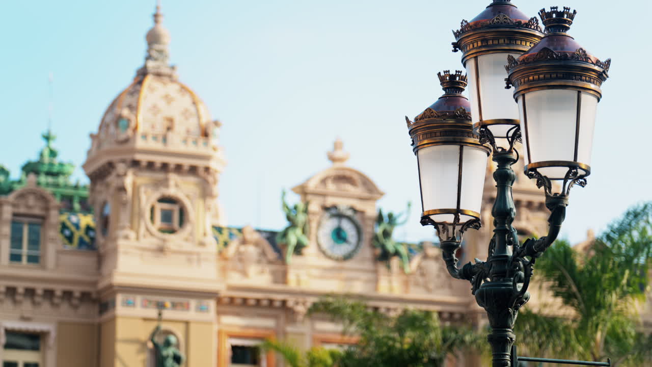 The facade of the Monte Carlo Casino with the blue sky on the background