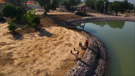 Drone-view-of-construction-workers-in-building-a-city-park-in-Mexico-city