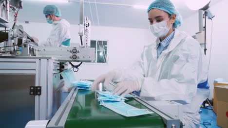 Face-mask-production-line-in-modern-factory