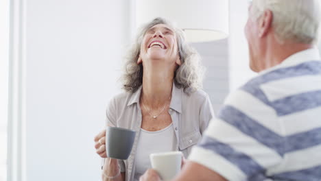 an-elderly-couple-having-an-conversation-together