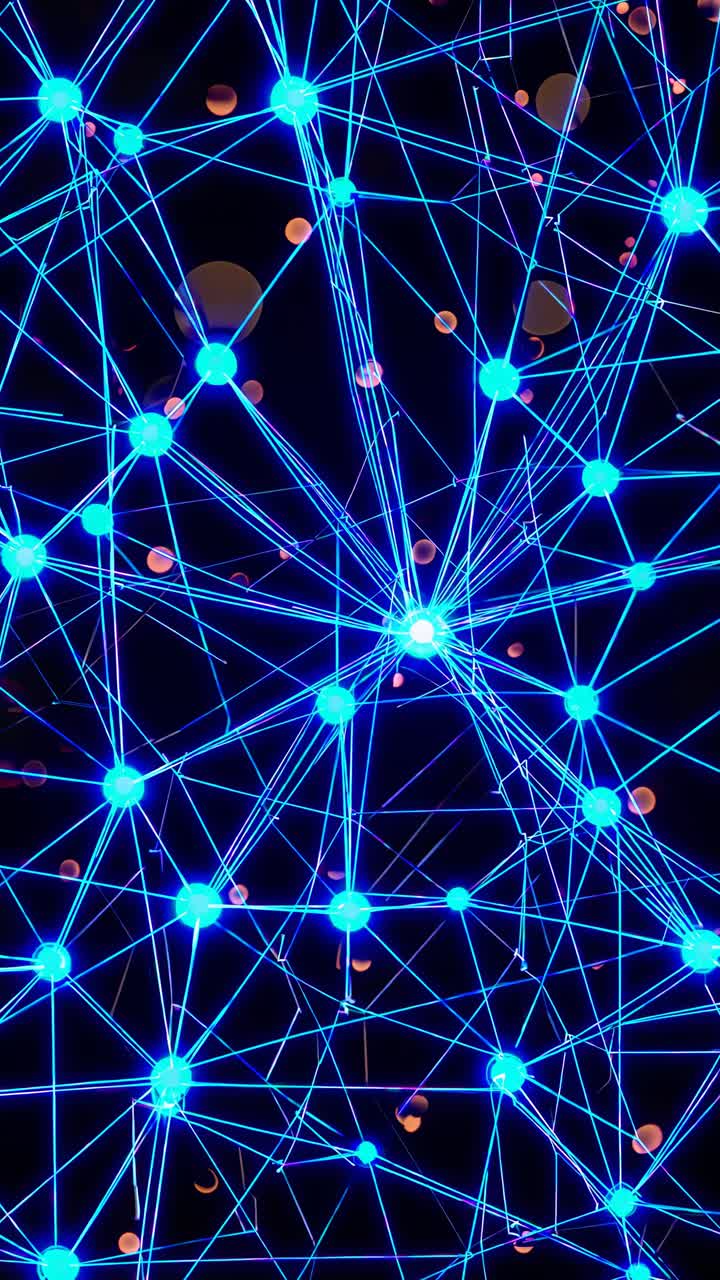 Top-down view of a digital network with glowing blue nodes and lines, resembling a futuristic video