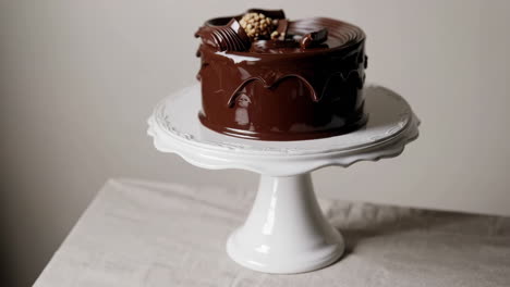 gourmet chocolate drip cake with nuts and swirls