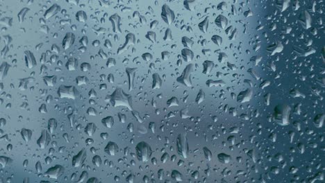 Close-up-and-pann-on-a-Rainy-Window