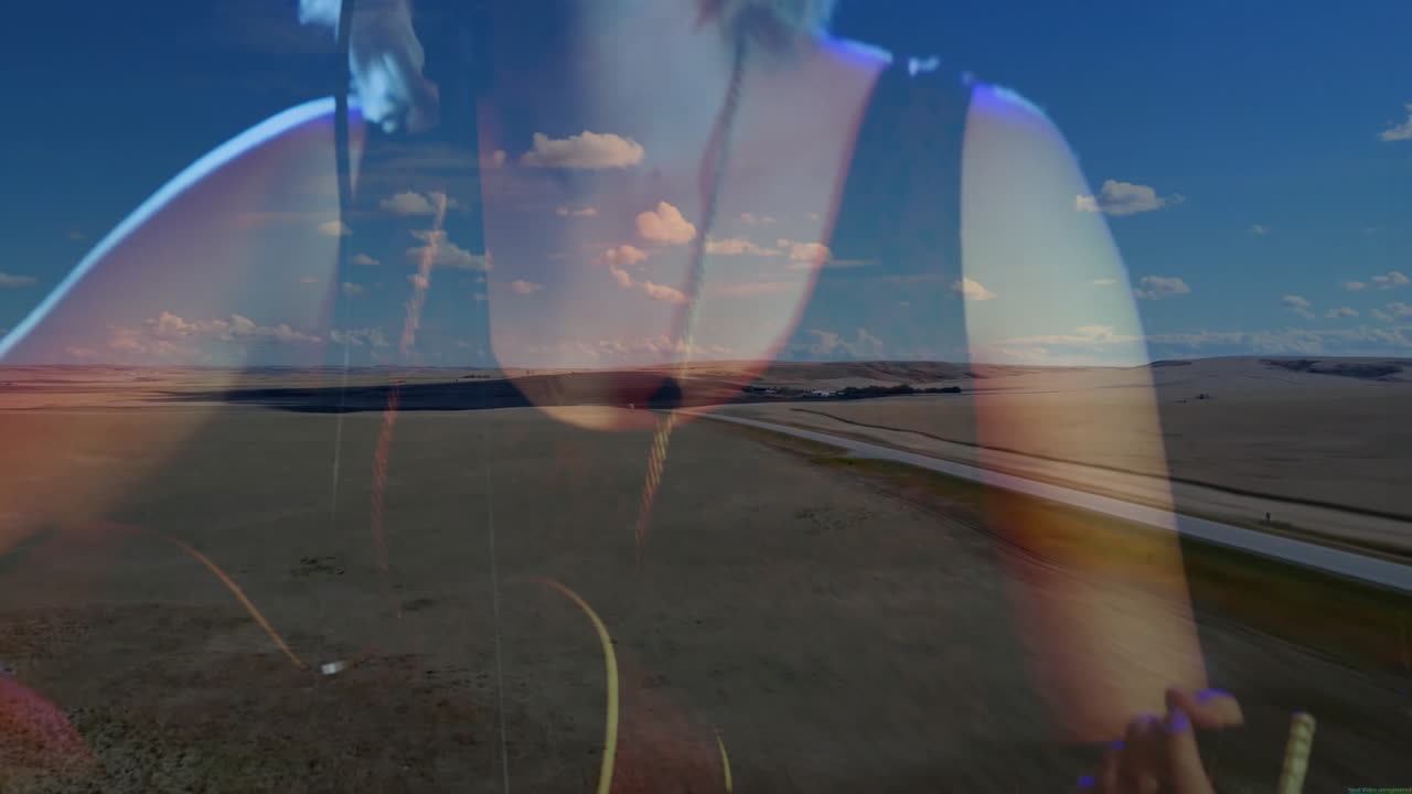 Teenage singer singing into microphone in rural music production, showing double-exposure overlay