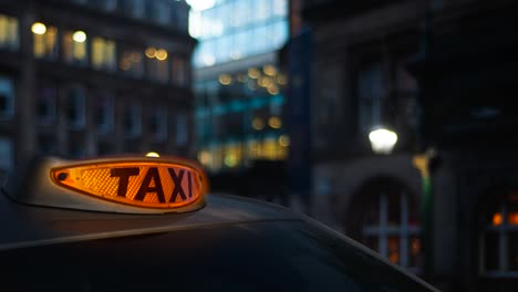 london taxi light at twilight