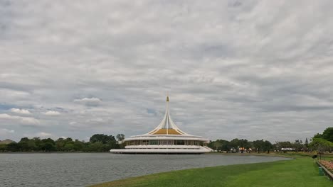 time-lapse of a pavilion by a calm lake.