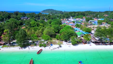 dream-beach-longtail-boats-in-turquoise-water