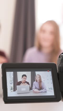 screen view, video bloggers making a video with a professional camera at home. creator content concept