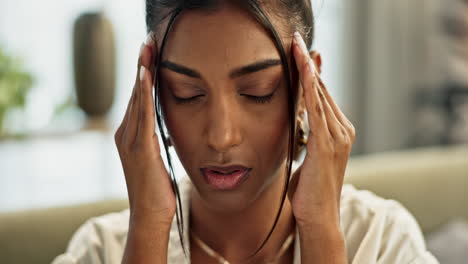 face, woman and stress in home for headache
