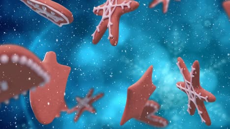 Animation-Von-Weihnachtslebkuchenplätzchen-über-Schneeflocken,-Die-Auf-Blauen-Hintergrund-Fallen