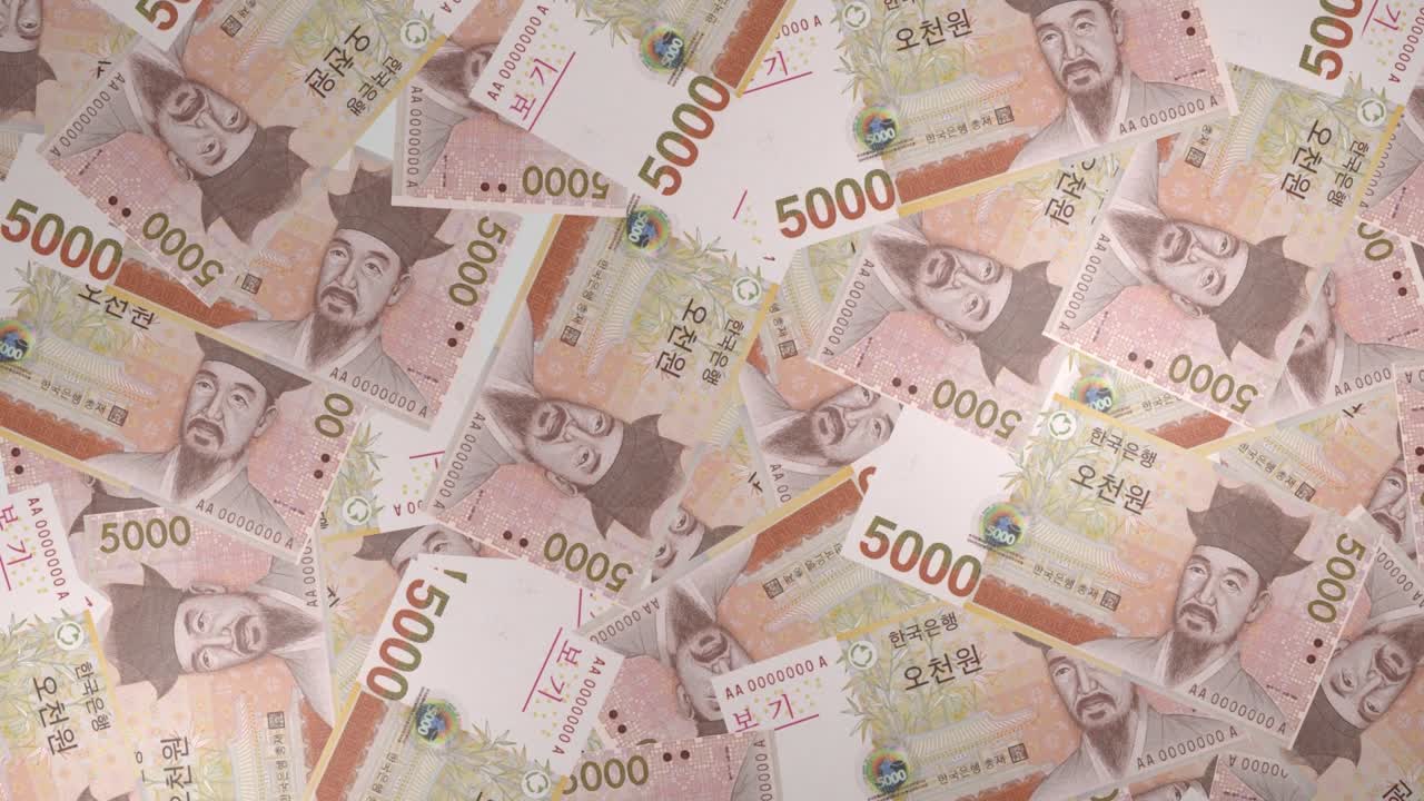 Nền các tờ tiền 5000 Won Hàn Quốc. Nhiều tờ tiền.