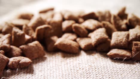 chocolate toast crunch arranged on textile 4k
