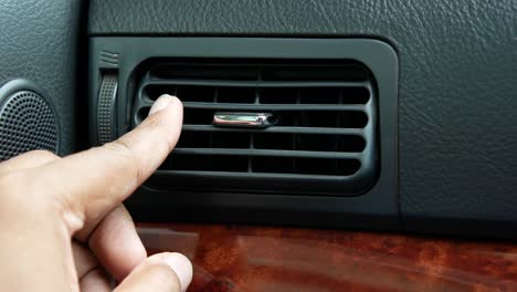 adjusting car air conditioning