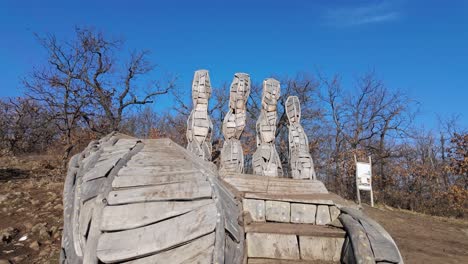 Medium shot of Palm of God wooden tourist attraction during the day near Holloko, Hungary.