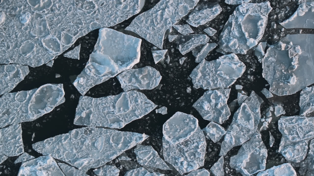 Aerial view of a frozen Hudson River. Shot in New York City