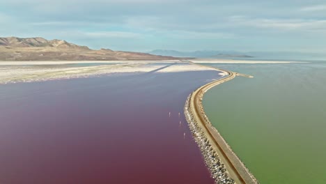 AERIAL---Railroad-tracks-in-Lucin-Cutoff,-Great-Salt-Lake,-Utah,-circle-pan