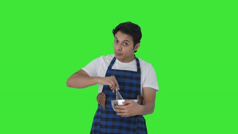 Indian-cook-telling-recipe-while-making-food-Green-screen