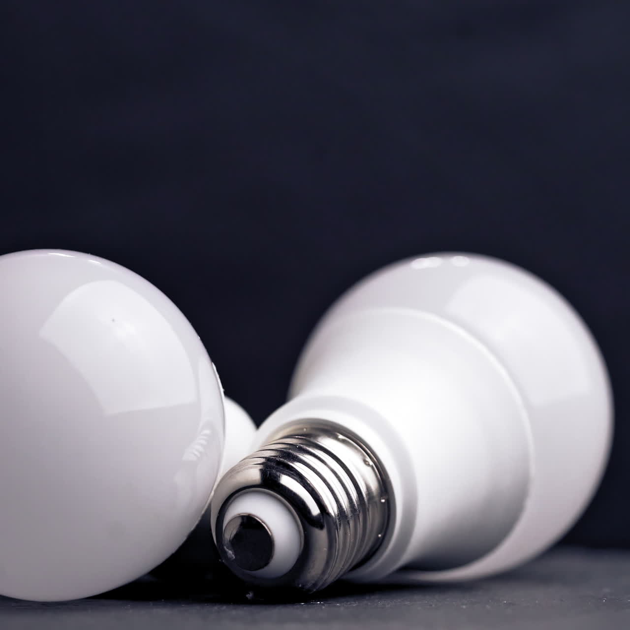 LED light bulbs on table with dark background