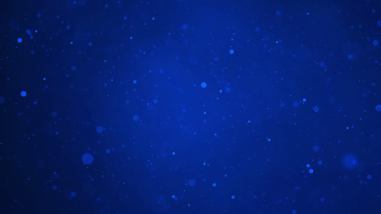 un fondo azul abstracto con luces y partículas bokeh en cámara lenta, creando una atmósfera tranquila, soñadora y etérea