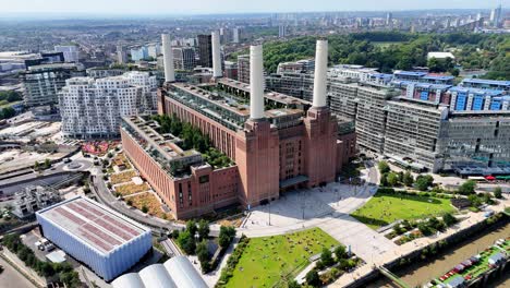high-resolution drone video flying over battersea, london, with sweeping views of the thames, power station, and contemporary riverside skyline