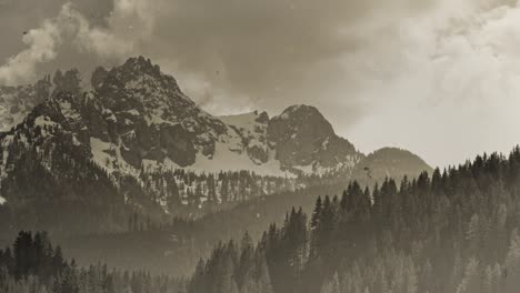 vintage scratched footage of a mountain landscape, location: dolomites, south tyrol, italy, 4k timel-apse