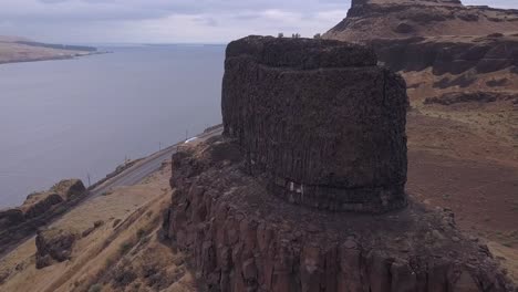 Highway-traffic-drives-past-huge-Twin-Sisters-rock-spires-in-WA-state