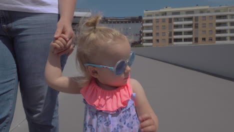 fashionable little girl in sunglasses