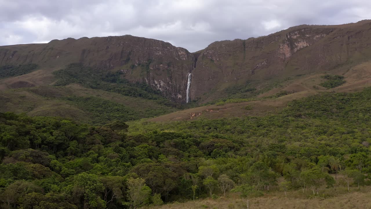 Serra da canastra with a waterfall and green landscape in minas gerais, aerial view