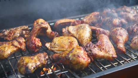 Delicious-chicken-pieces-frying-on-barbecue-grill