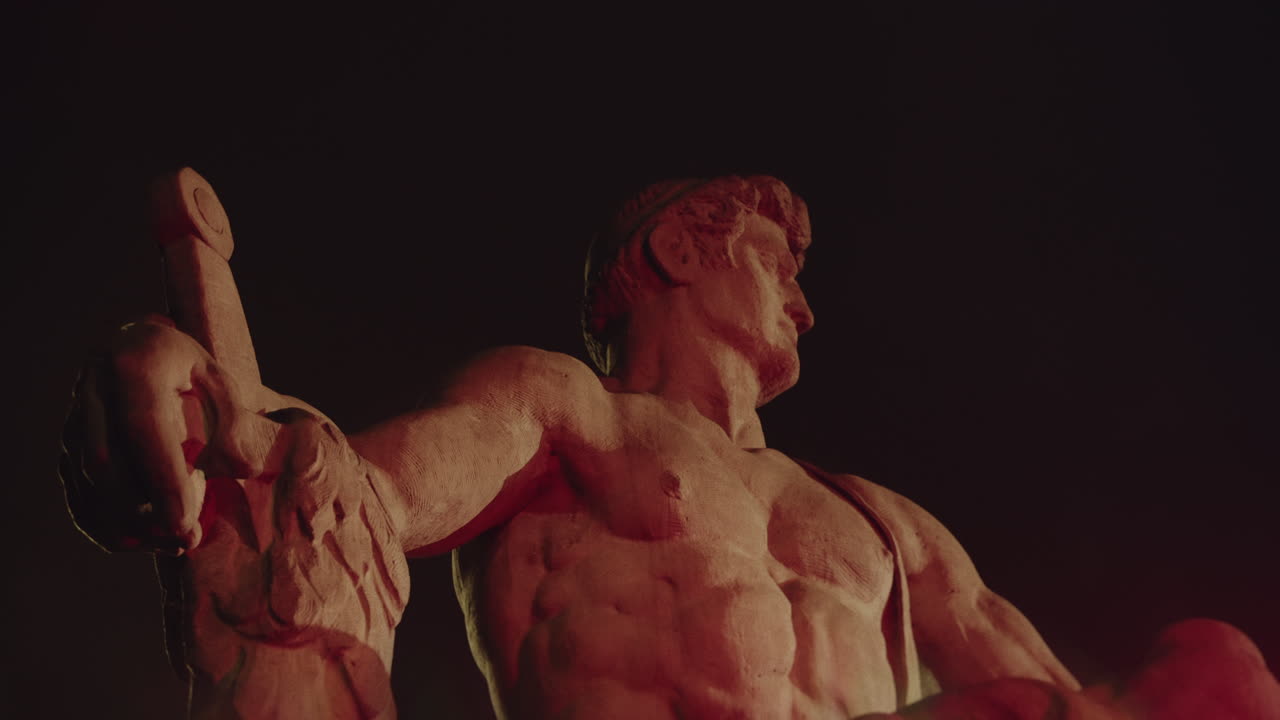 Epic, ancient stone statue at night