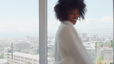 happy-woman-dancing-at-home-wearing-pajamas-having-fun-celebrating-lifestyle-achievement-enjoying-happy-dance-in-penthouse-apartment