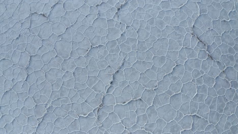 drone aerial footage rising upwards above hexagonal shape salt flats in death valley national park, california , united states