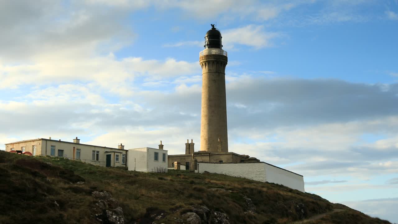 Ardnamurchan Lighthouse with blue sky and clouds, Scotland