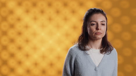 Person-dressed-in-casual-attire-standing,-isolated-over-studio-background