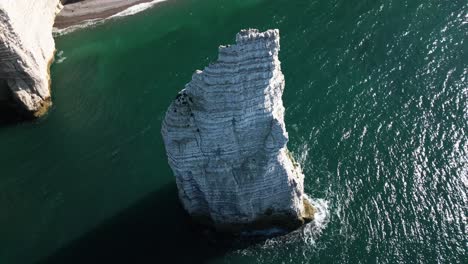 big and beautiful chalk cliffs growing out of the sea, atlantic ocean, drone, france, etretat