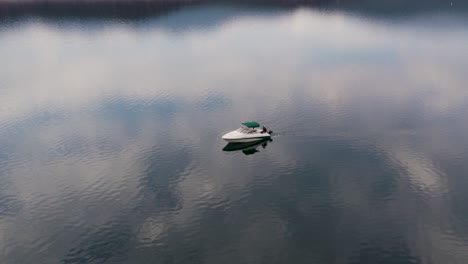 lonely fisherman on a boat in flaming gorge reservoir, utah