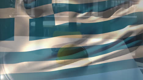 Animación-De-La-Bandera-De-Grecia-Ondeando-Sobre-Un-Casco-Amarillo-Y-Un-Plano-De-Planta-Sobre-Una-Mesa-Contra-Una-Ventana-De-Cristal.