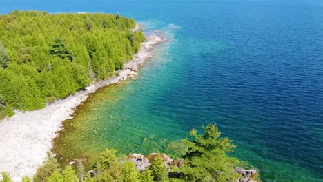 panoramic aerial view of the dense forests on the shores of georgian bay, canada