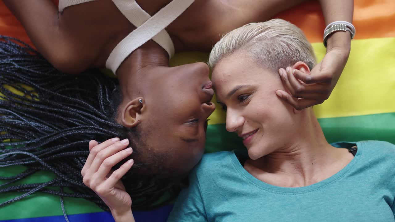 Lesbian couple on pride flag