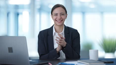 Happy-Indian-business-woman-clapping-and-appreciating