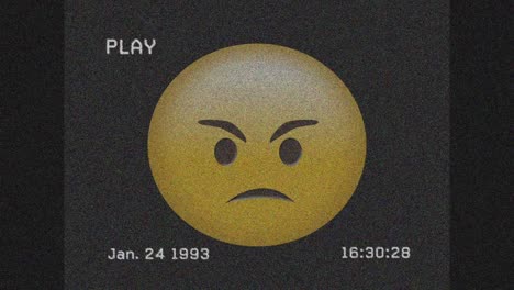 digital animation of vhs glitch effect over angry face emoji against grey background