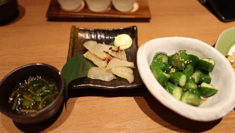 assorted appetizers on a wooden table setting