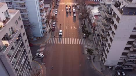 aerial - large avenue at sunrise in palermo, buenos aires, argentina, descending