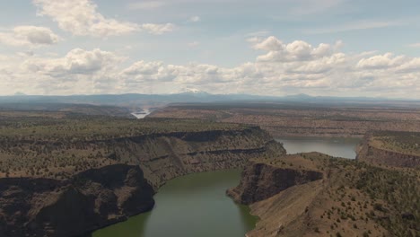 beautiful aerial view of the cove palisades state park during a cloudy and sunny summer day