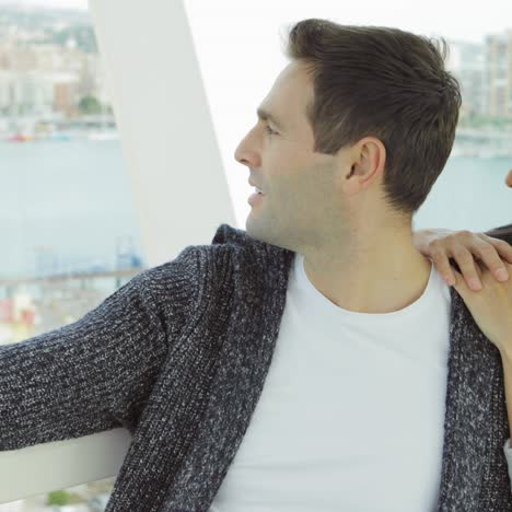 Couple-sightseeing-on-a-cable-car-or-ferris-wheel