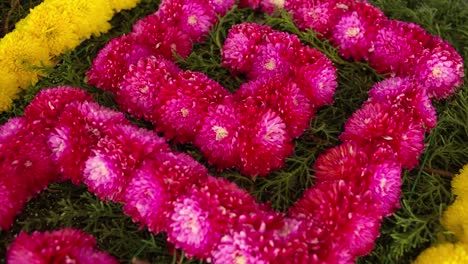 slow motion close up shot of a flowers arch for a mexican party