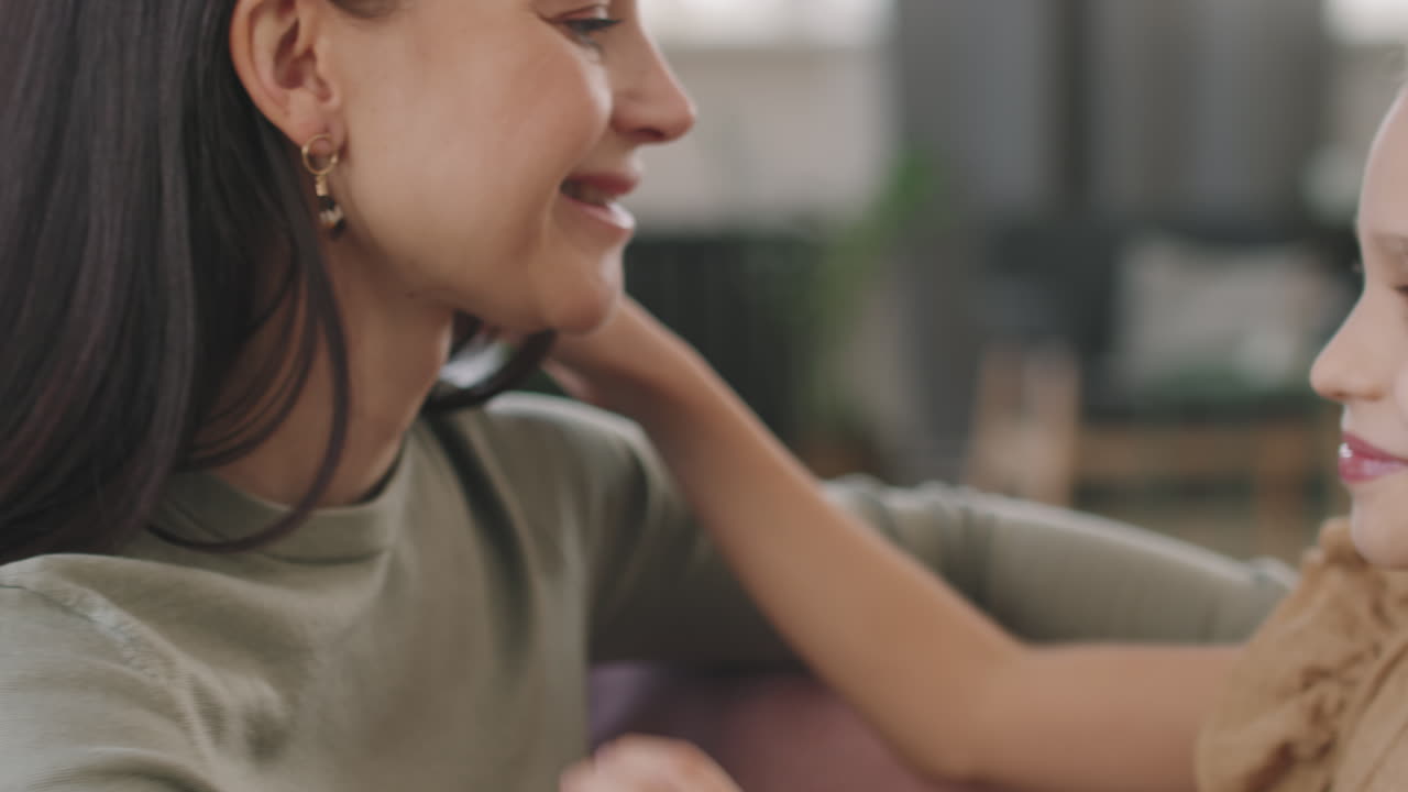 A girl hugging her mother