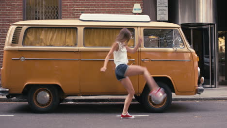 contemporary funky caucasian woman street dancer dancing freestyle in the city