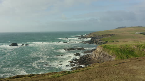 aerial low flying view over sea cliffs along the coastline of co kerry ireland