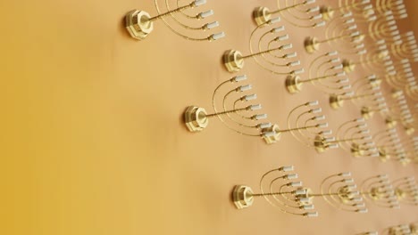 golden menorahs on a vibrant yellow background vertical